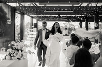 Bride and Groom enter their McLaren Vale winery wedding at Mitolo Wines  